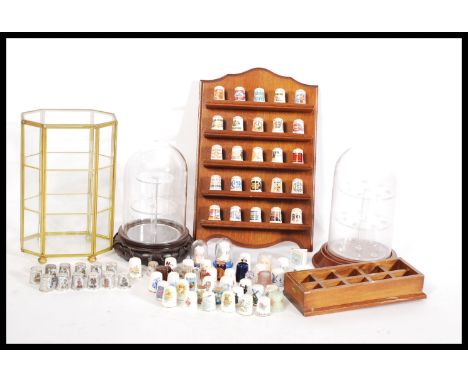 A collection of vintage thimbles to include a 12 Hummel ARS silver plated examples. various advertising examples to include B