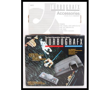 An original retro ' TurboGrafx ' electronic games console, Inner contents appears mint. Also to include an "accessories" box,