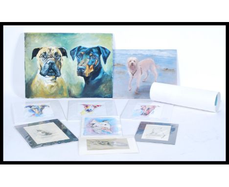 A selection of contemporary prints and paintings of dogs and cats to include a signed print by Bath based artist Sally Muir e