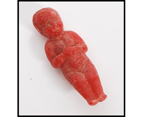 A rare 19th Century red soap doll in the form a baby distributed as a novelty advertising item during the 1896 US presidentia