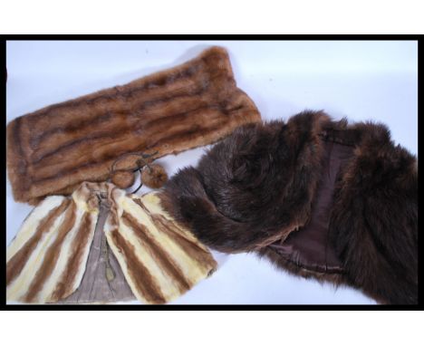 A selection of vintage furs dating from the early 20th Century to include an Edwardian childs rabbit fur stole, a mink fur st