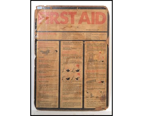 A vintage retro 20th century large First Aid board on card featuring 1970's instructions and imagery.&nbsp;Measures:&nbsp; 86