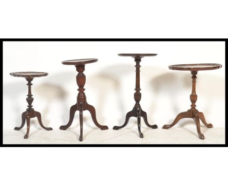 A 19th century mahogany pedestal wine table with pie crust edge together with another late 19th century Victorian example, an