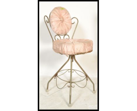 A retro vintage 20th century bedroom boudoir wire work dressing table chair having a scroll work metal frame with velour butt