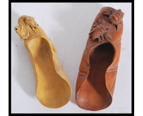Two 20th Century Chinese tea powder scoops / caddy spoons, carved from fruitwood the first carved with crickets and the other