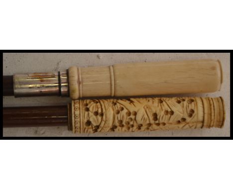 Two early 20th Century Edwardian&nbsp; walking canes having tapering shafts, one with bone ring turned ivory handle and later