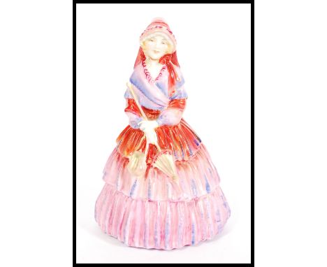 A Royal Doulton ceramic figurine entitled Lady Clare HN1465. Stamped to base. Measures 20cm high.&nbsp;Painted mark to base p