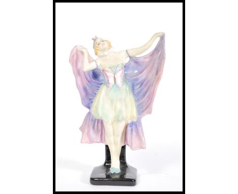 A 1930's very rare Doulton figurine ' Butterfly ' ceramic model of a girl in butterfly costume. the underside with Royal Doul