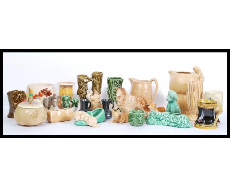 A selection of SylvaC ceramic ornaments to include a Donkey figurine with cream baskets, a green dog planter no. 2024, a Coll