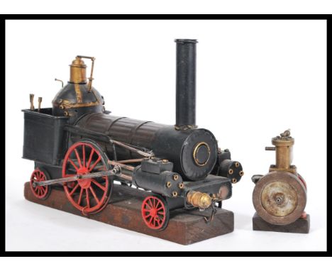 A vintage scratch built engine of small proportions ( built by the vendors husband many years ago ) together with a tin plate
