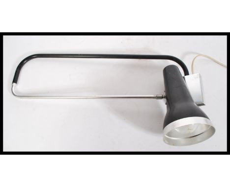 A mid century wall mounted adjustable angle poise desk lamp with pendant shade and chrome and ebony arm.