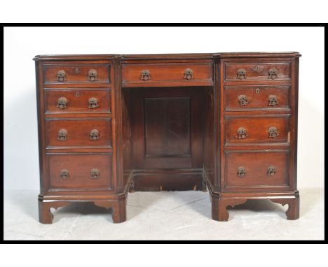 A 19th century heavy solid mahogany inverted twin pedestal desk. Raised on ogee&nbsp; bracket feet with drawers to each pedes