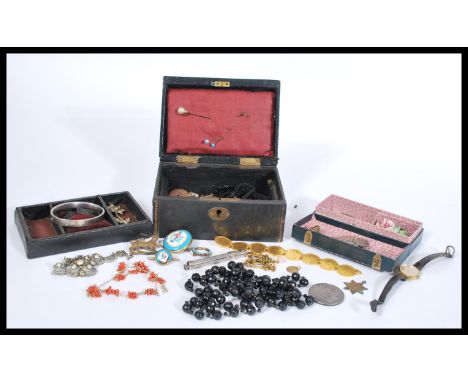 A collection of vintage costume jewellery to include various mother of pearl buttons, turquoise brooch, Jet and French jet it