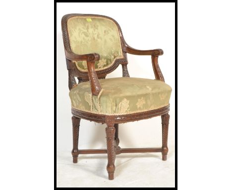 A 19th Victorian Chippendale revival office desk chair / armchair. Raised on spiral twist tapering legs united by an 'x' stre