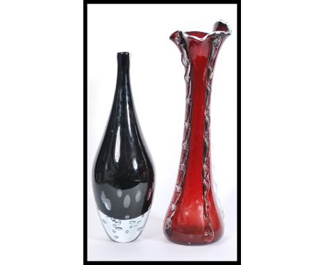 Two vintage retro 20th Century studio art glass vases of large tall form comprising of a red cranberry glass Murano handkerch