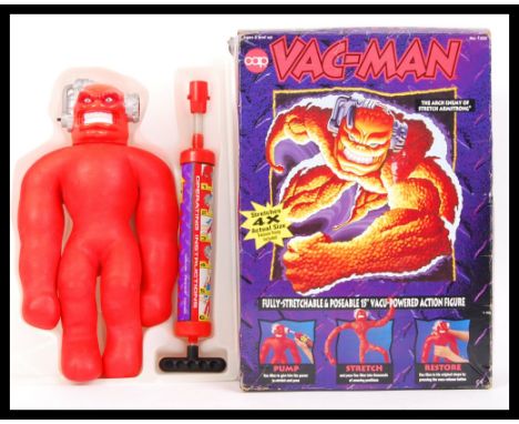 A fabulous 1990's Cap Toys made ' Vac-Man ' action figure. Similar to Stretch Armstrong, the figure appears mint, within the 