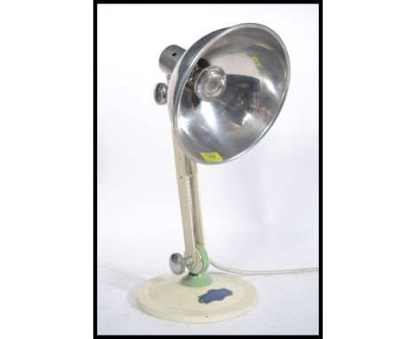 A vintage retro 20th Century two tone enamel heat lamp, converted and rewired in to a desk lamp, the polished chrome pendant 