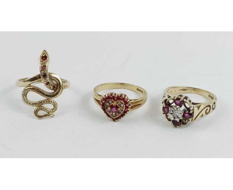 A 9 carat gold diamond and ruby heart shaped cluster ring, finger size N; a 9 carat gold stone set serpent ring; and a 9 cara