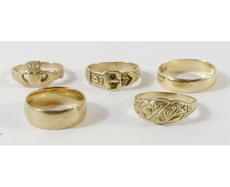 A 9 carat gold Claddagh ring, finger size M; two 9 carat gold wedding rings; and tow other 9 carat gold rings; 11.9g gross 