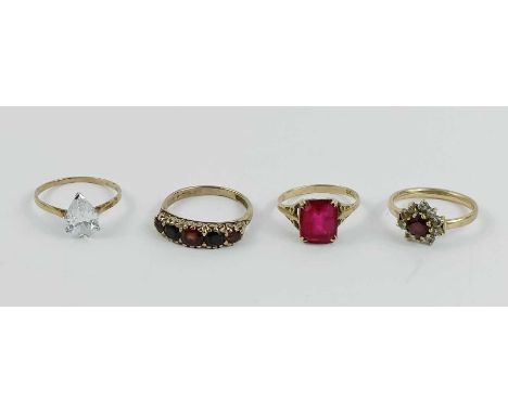 A 9 carat gold five stone garnet ring, finger size O ½; with three other stone set 9 carat gold ring; 7.6g gross 