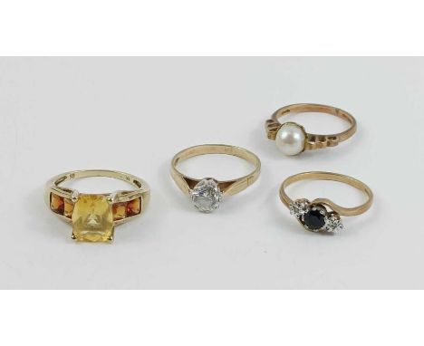 A 9 carat gold cultured pearl set ring; a citrine set ring, stamped ‘9K’; a 9 carat gold cubic zirconia single stone ring; an