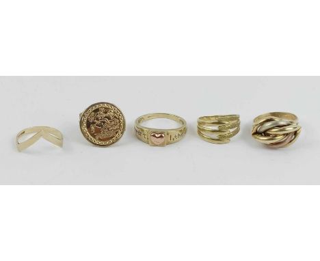 A three colour 9 carat gold QVC knot ring; another QVC 9 carat gold ring with a heart motif; and another 9 carat gold QVC rin