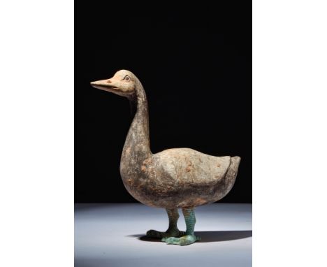 Ca. 202 BC - AD 220.A terracotta figure of a goose, naturalistically modelled with a rounded body and arched neck. The bird s
