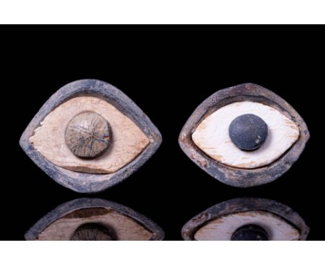 Ca. 2600 - 2400 BC.A pair of eye inlays, each formed of an almond-shaped sclera set within a dark stone surround. Both are in