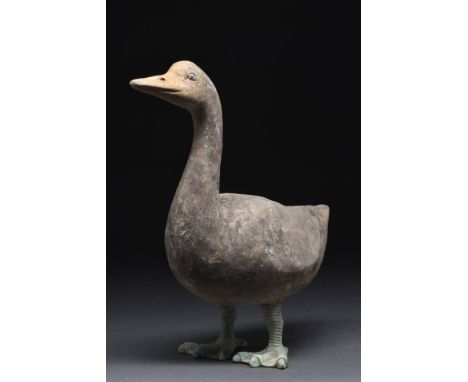 Ca. 202 BC - AD 220.A terracotta figure of a goose, naturalistically modelled with a rounded body and arched neck. The bird s