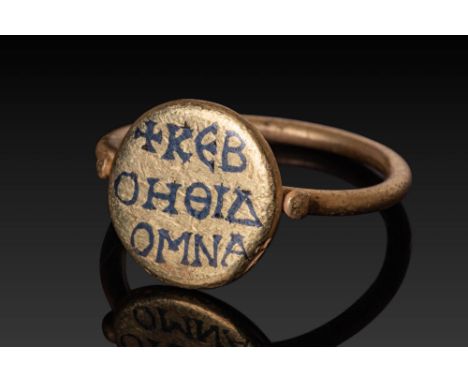 Ca. AD 500 - 700. A gold ring with a circular bezel inlaid with niello, inscribed in Greek across three lines: “ΚΕΒ / ΟΗΘΙΔ /