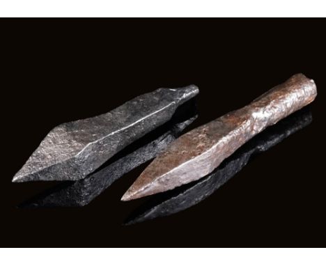 Ca. AD 900 - 1200.A set of two Medieval iron crossbow bolts covered in a rich russet-brown patina. Crossbows superseded bows 