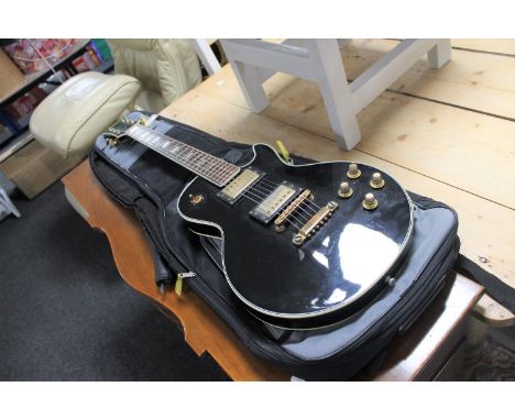 A vintage Jedson Les Paul style guitar in carry bag 