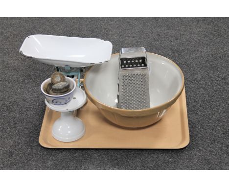 A tray of vintage scales with weights, pottery mixing bowl, metal grater etc 