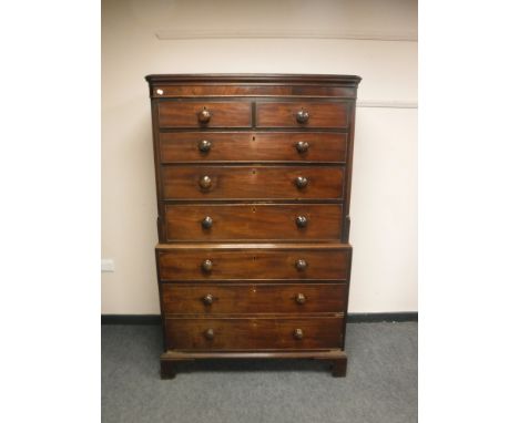 A George III mahogany eight drawer double chest on bracket feet, width 108 cm 