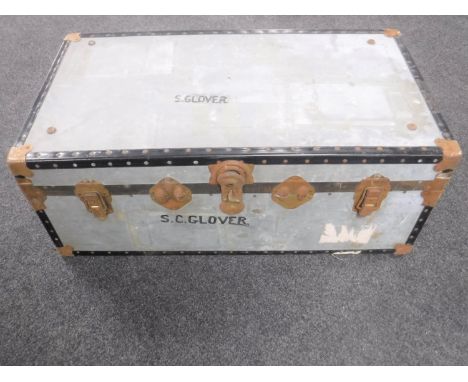A twentieth century tin trunk