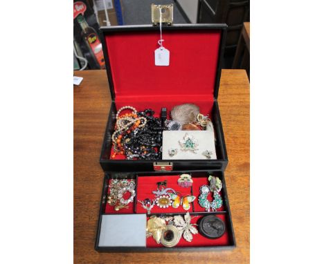 A box of vintage costume jewellery