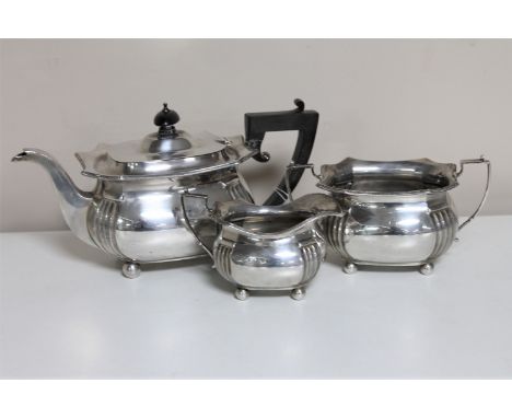 A silver three piece tea service, 1107.9g, Birmingham 1942. (3)