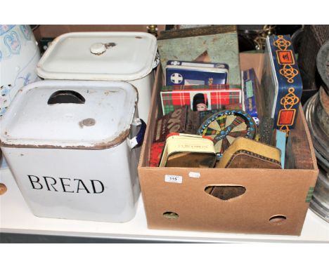 Two enamel bread bins and a box of various vintage tins
