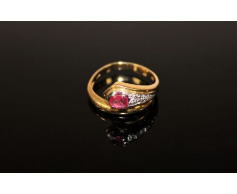 An 18ct gold ruby and diamond snake ring, 4.7g