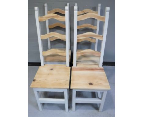Four pine ladder back dining chairs 