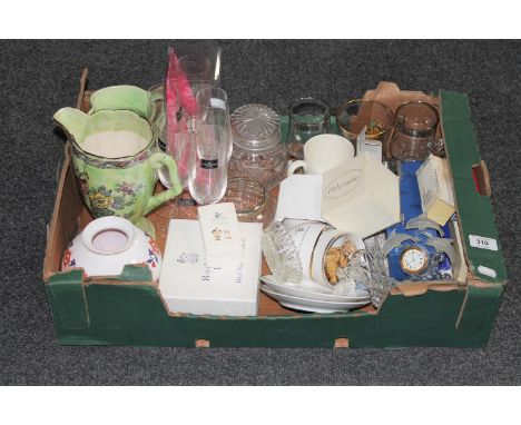 A box of commemorative brass ware, Arthur woods jug, spode vase, commemorative china together with a boxed Swarovski Memories