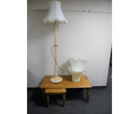 A pine coffee table fitted a lamp table and a standard lamp with three shades 