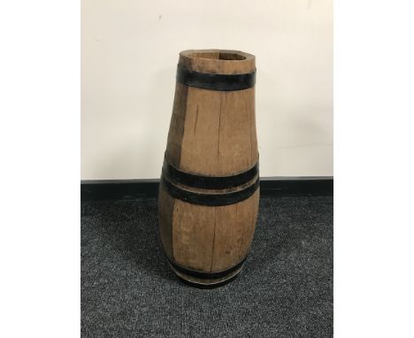 An oak coopered barrel in the form of a stick stand 