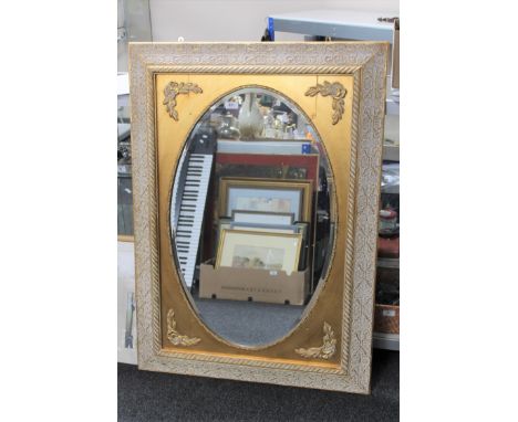 An antique style gilt framed mirror 