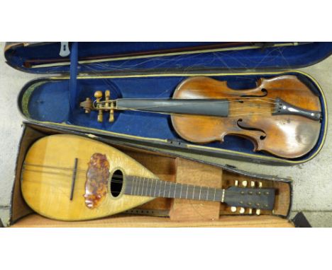 A violin and a mandolin, cased, a/f, violin back 36cm without button 