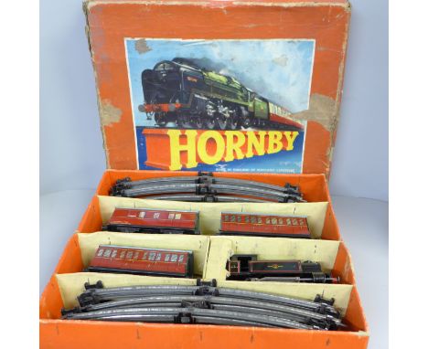 A Hornby O gauge clockwork Tank Engine (No. 82011), Passenger Set (No.41), box damaged 