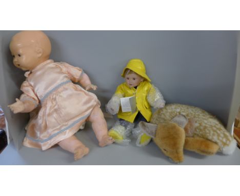 A Steiff Lorii sleeping fawn, a composition doll and a Danbury Mint Lifeboats Ben doll 