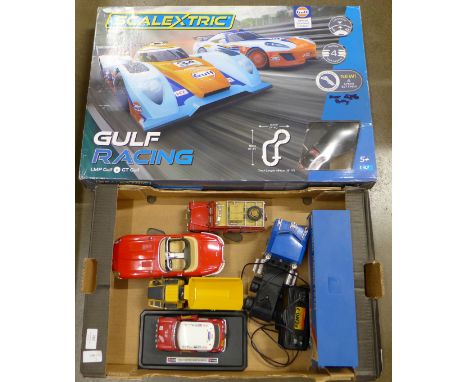 A Scalextric Gulf Racing set, boxed, a Burago Mini Cooper Monte Carlo and E-type Jaguar, John Deere Tipper, Polistil Land Rov