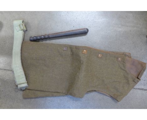 An Army flying tunic, belt and a truncheon 