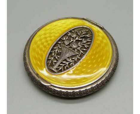 A white metal and yellow guilloche enamel compact, small area of wear to the enamel near hinge 